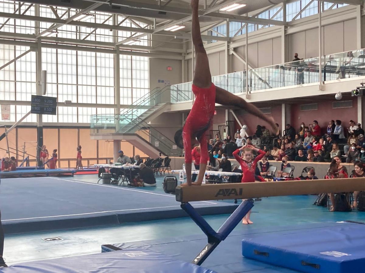 Amaya Smith on beam