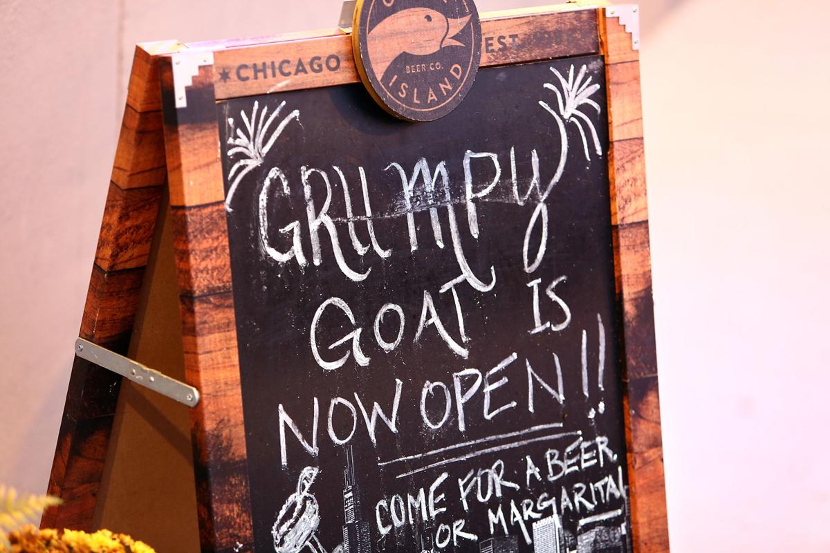 now open grumpy goat.jpg