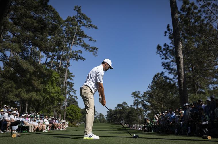 Moving Day at Masters: McIlroy hangs on as others charge