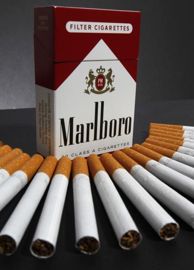 price for marlboro cigarettes Marlboro maker Altria 3Q profit falls on charges