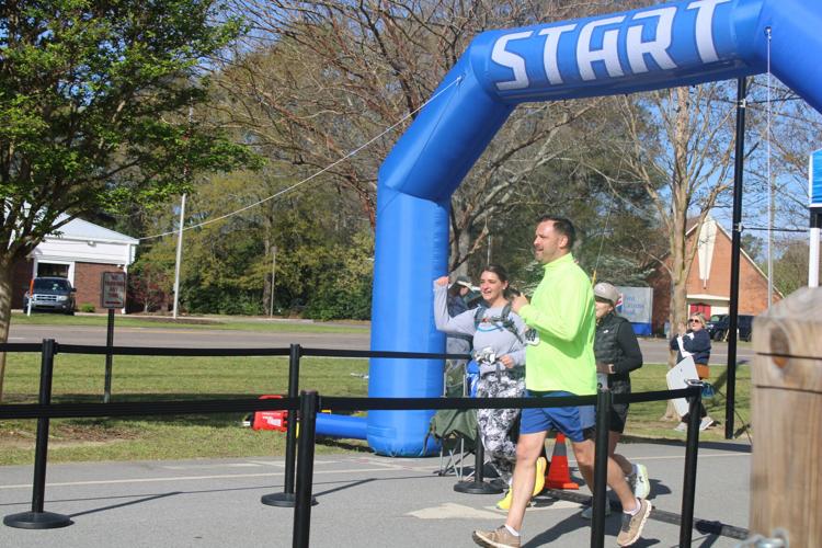 Runners near and far compete in 5K and 10Mile Triple Crown Road Race