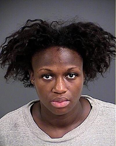 Woman accused in knife slaying