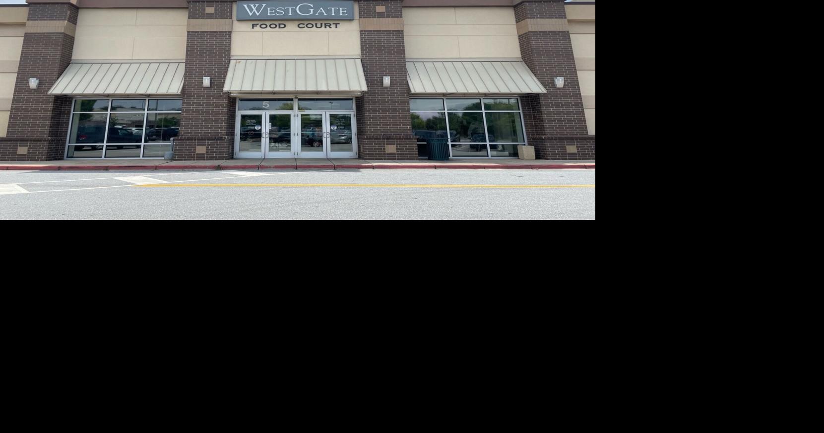 A bystander was struck by gunfire during a WestGate Mall shooting. Now he's suing.