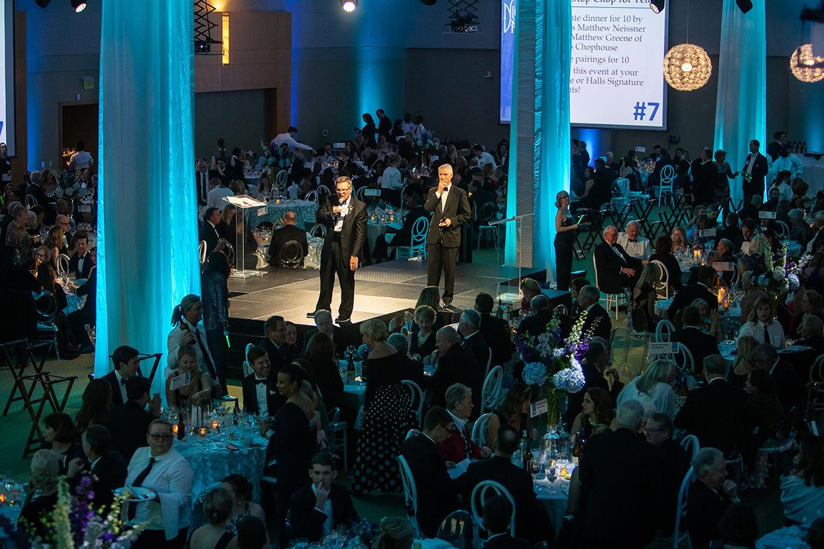 Auctioneer Tom Crawford_Emcee Chris Fraser.jpg