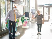 Marie-Louise Moreto receives award from Mayor Haynie