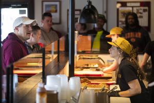 How does a new Charleston barbecue restaurant stack up against the competition?
