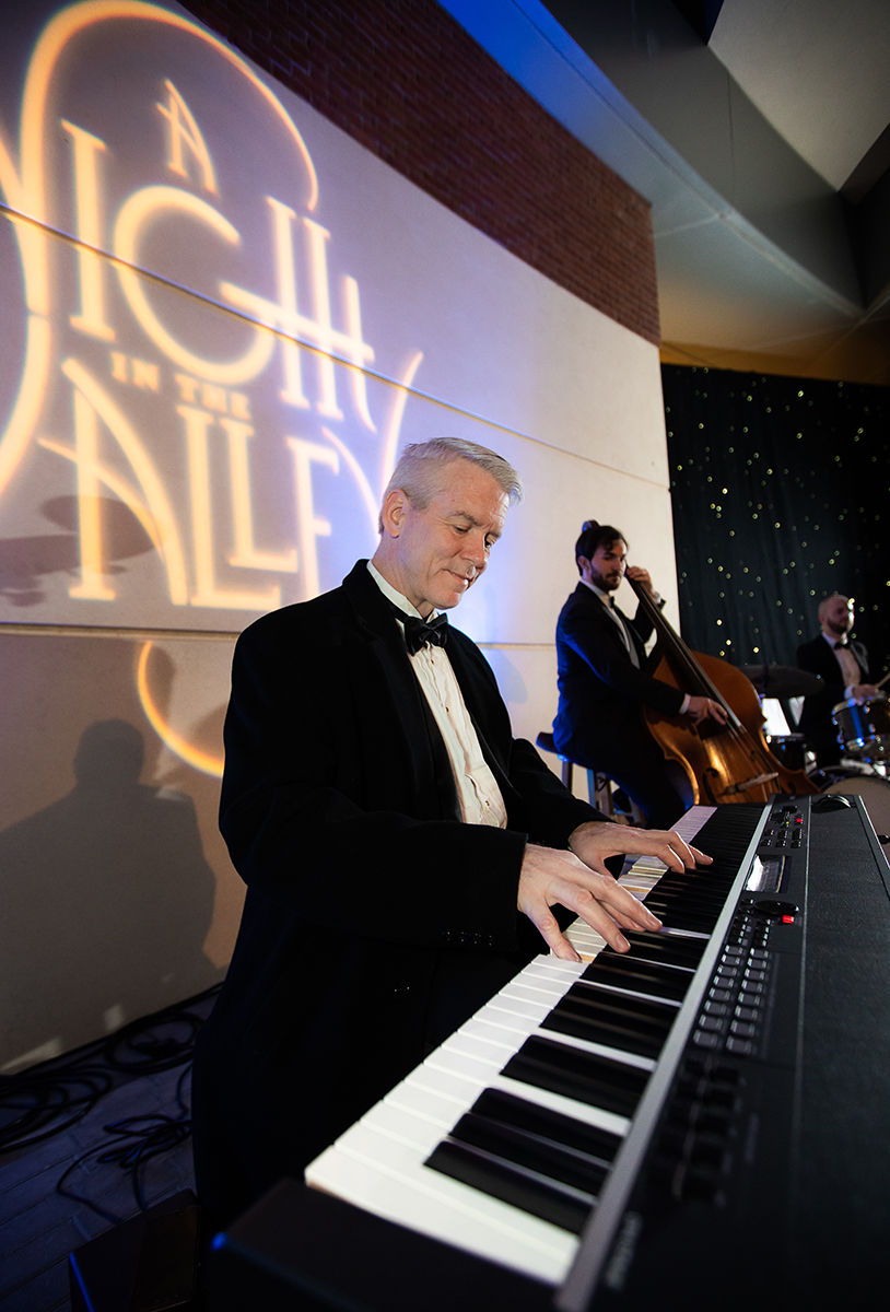 The Frank Duvall Jazz Trio perform on the portico.jpg