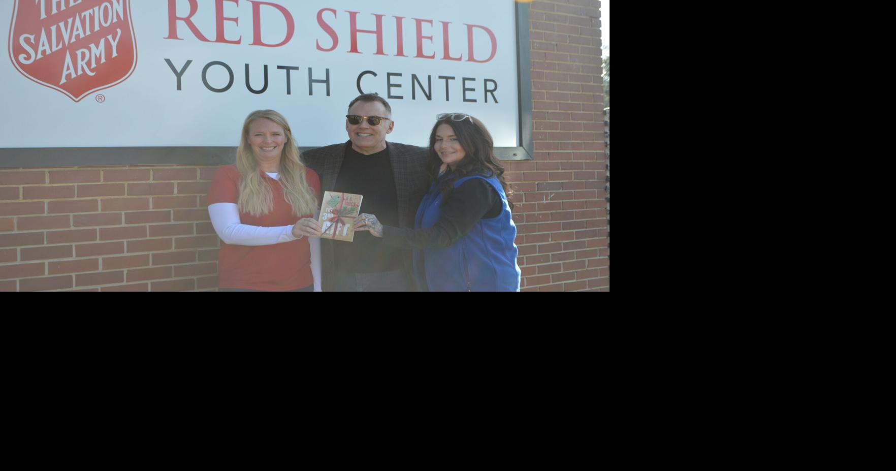 Bestselling thriller author donates $2K to Aiken literacy program, says he plans to keep giving