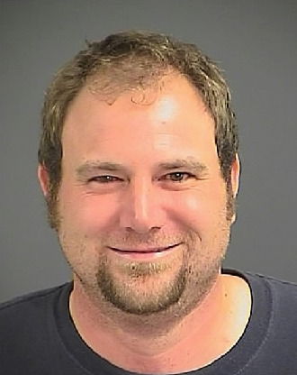 Profanities land Folly leader in jail