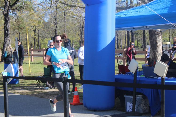 Runners near and far compete in 5K and 10Mile Triple Crown Road Race