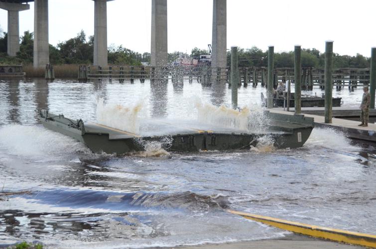 At the ready: National Guardsmen deploy raft, ready to help Georgetown ...