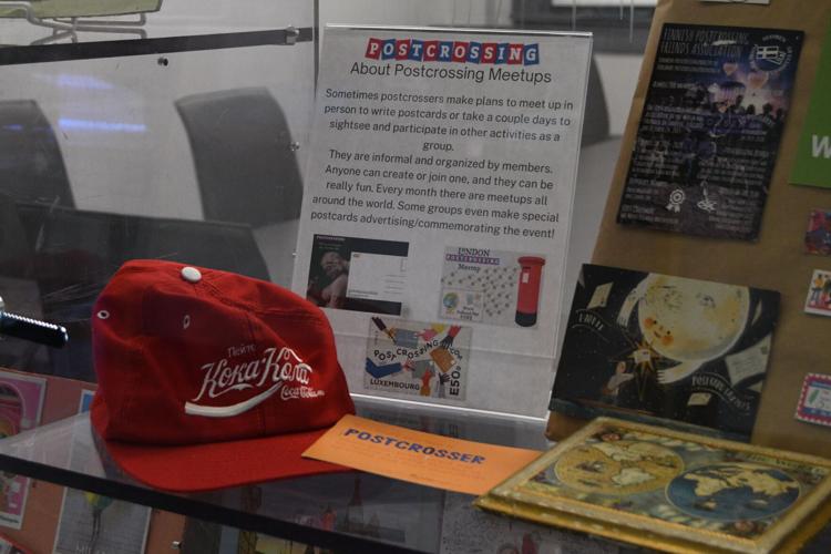 Lifelong traveler creates postcard display at Aiken Library