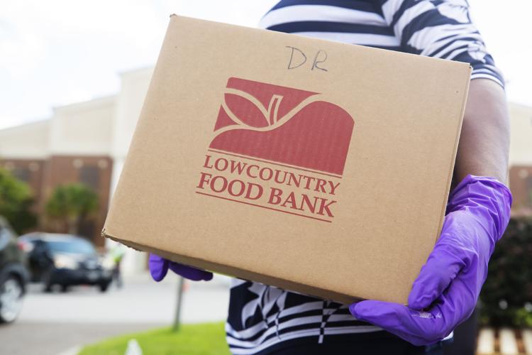 Photos: Lowcountry Food Bank hosts drive thru food distribution as