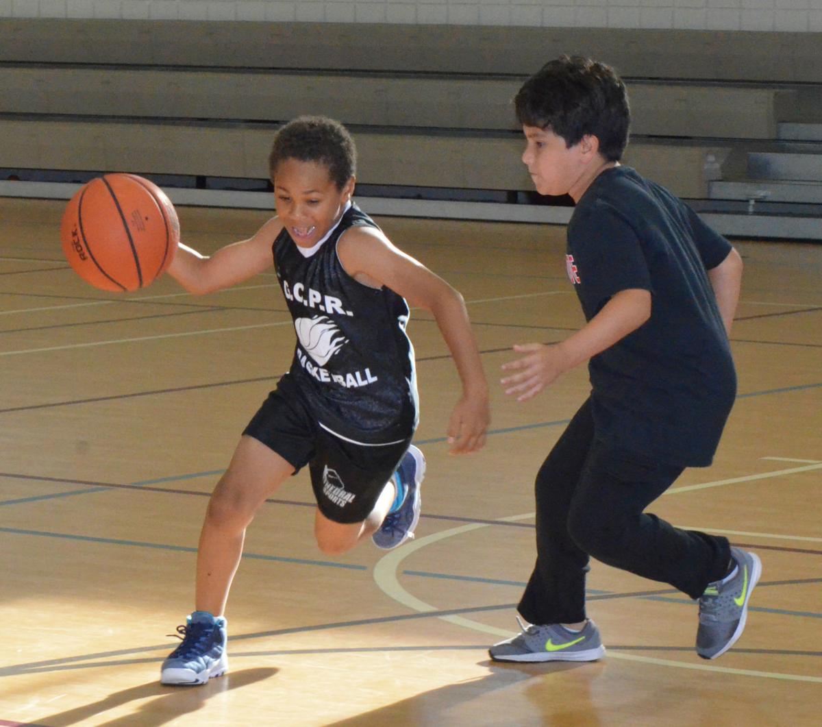 Dribble And Shoot Basketball Camp Teaches Children Basic Skills