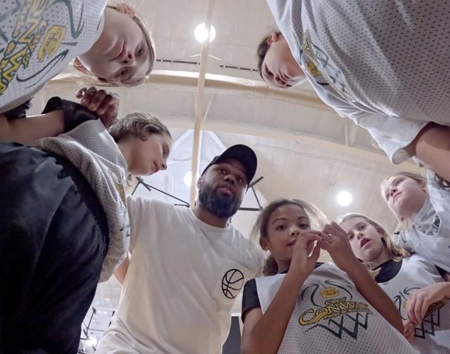 Conway man coaches in basketball gym where he almost died
