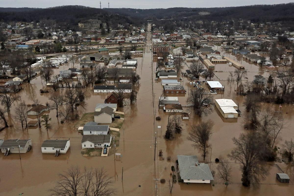 Flooding overwhelms Midwest