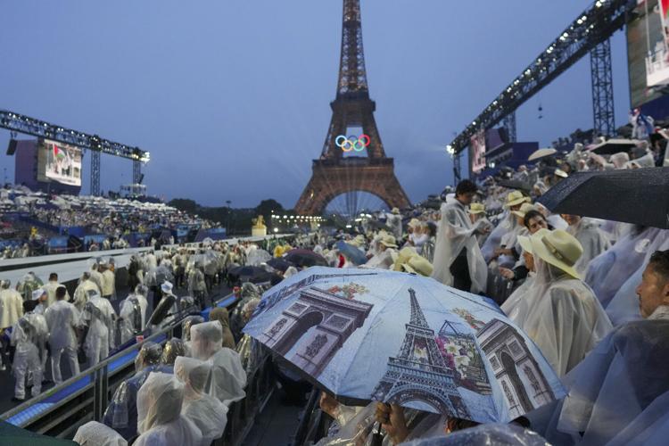 Paris dazzles with a rainy Olympics opening ceremony on the Seine River