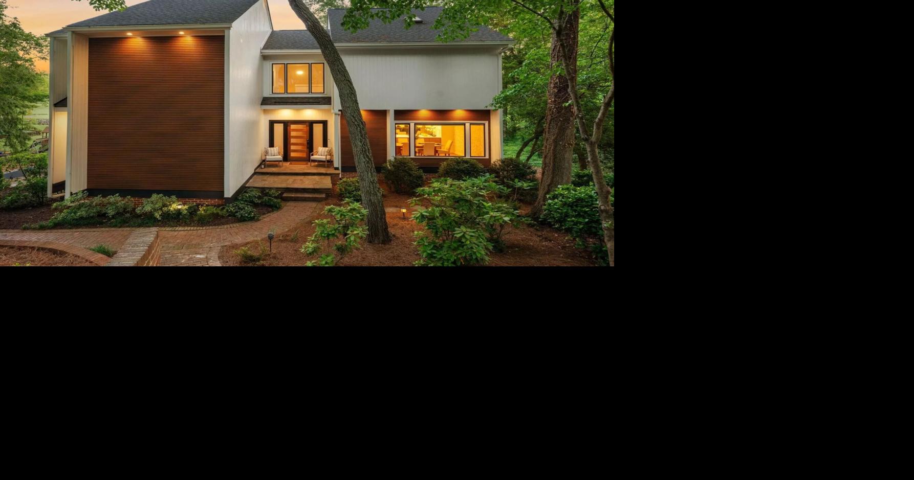 This $1.6M listing with views of Greenville golf course offers contemporary design