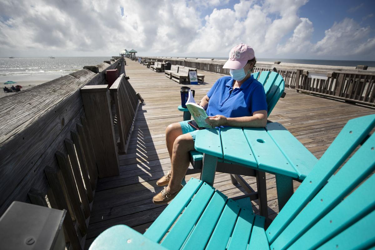 reading on pier.JPG