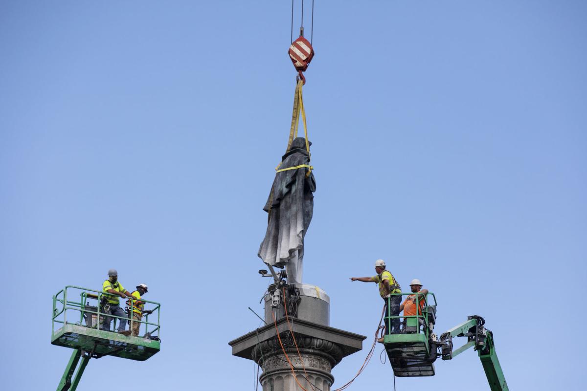 workers by statue.jpg