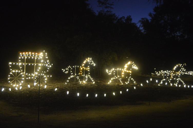 Workers give Christmas in Hopelands a light check on opening night
