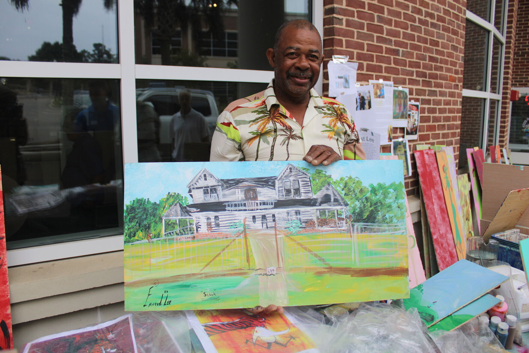 Ernest selling “Chicken Man” Lee Original Folk Art Painting