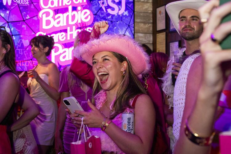 Photos: Barbie party-goers all dolled up at Share House, Multimedia