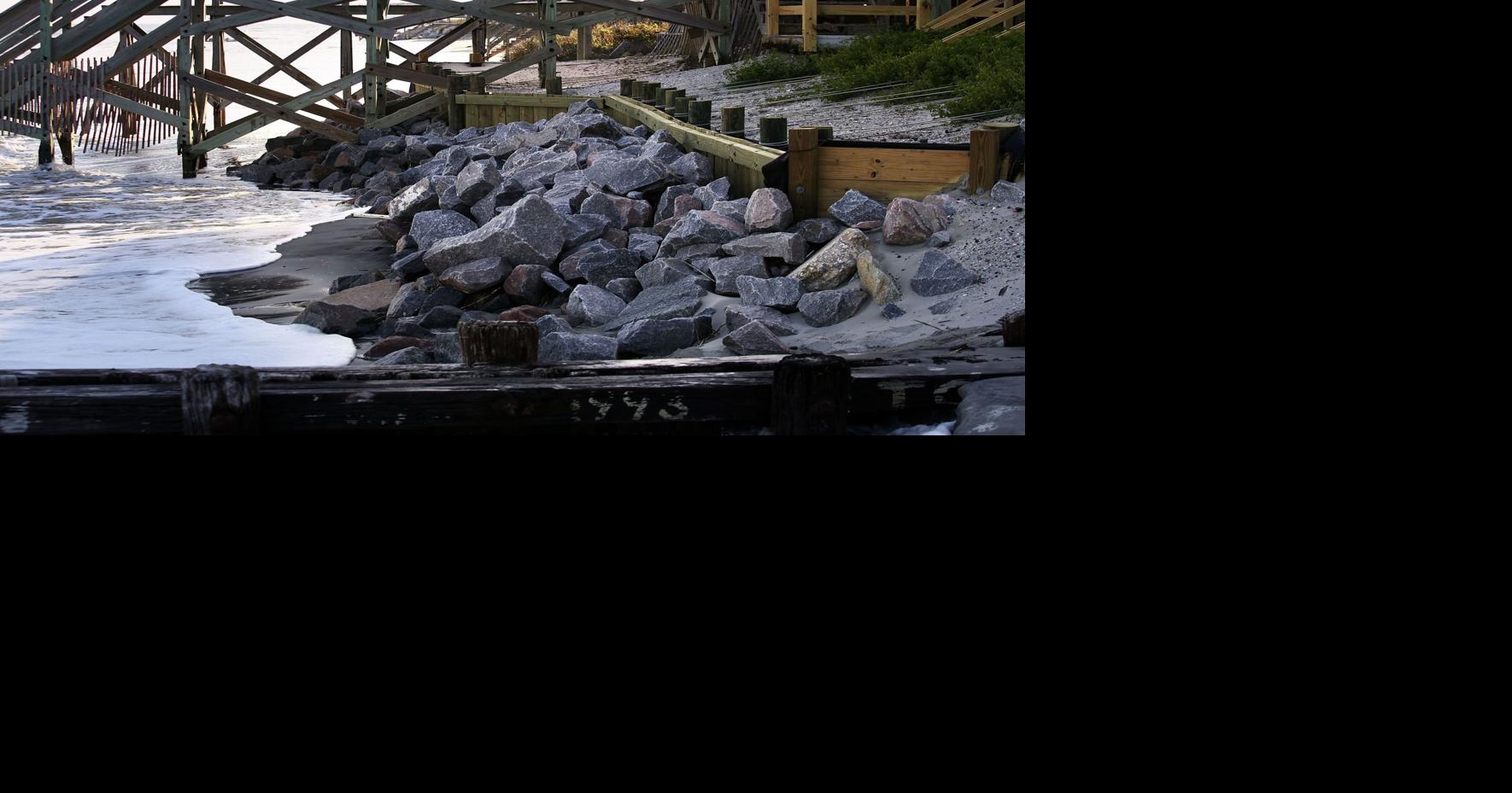 Sea walls speed erostion, destroy beaches, adjacent property