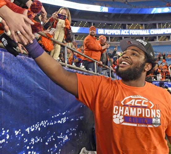 Photo: Christian Wilkins from Clemson receives a jersey from NFL