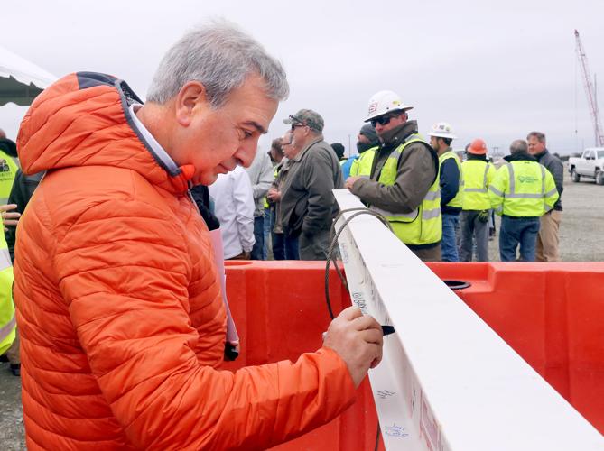 Photos Hugh K. Leatherman, Sr. Terminal topping out ceremony