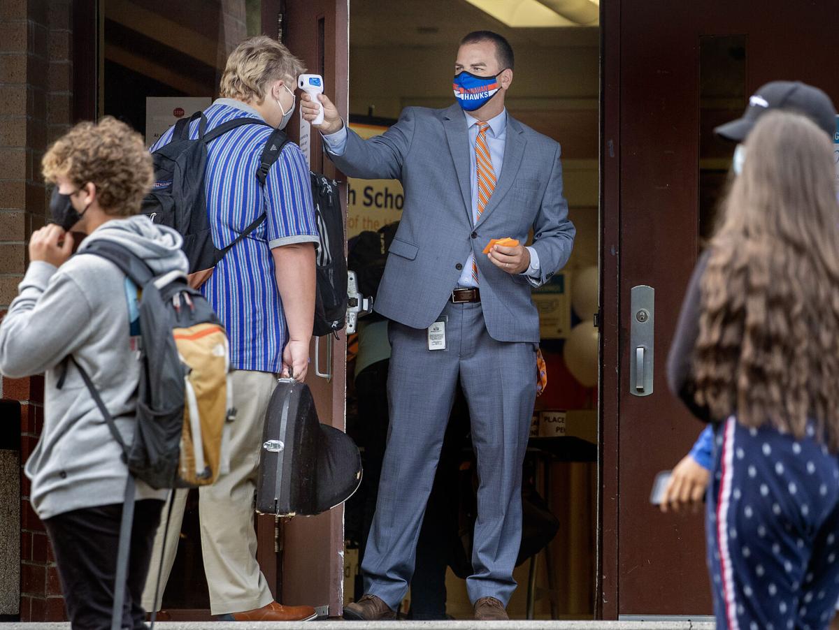 INSIDE PRINT Hanahan principal temp taking.jpg