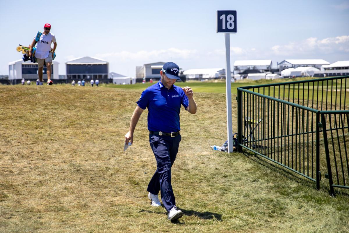 Branden Grace walking off 18.JPG