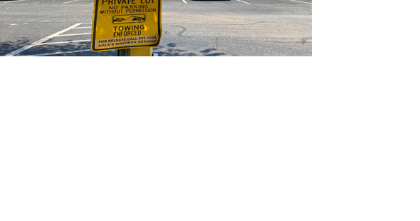 Greenville's prime parking lot site no longer for sale | Greenville Business - Vimarsana News