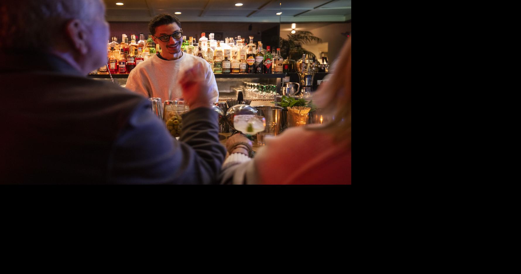 Can you recommend a Charleston restaurant bar that's friendly and fit for socializing?