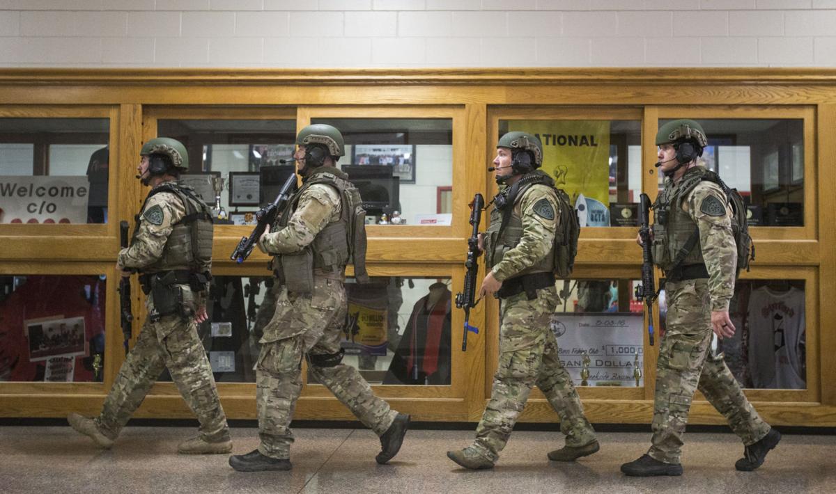 officerswalkdownhallway.jpg