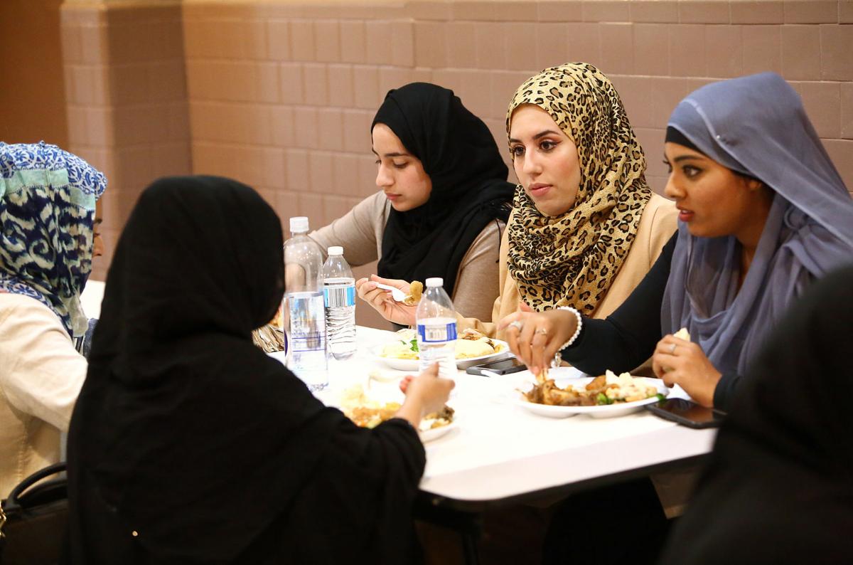 women eating mosque ramadan.jpg