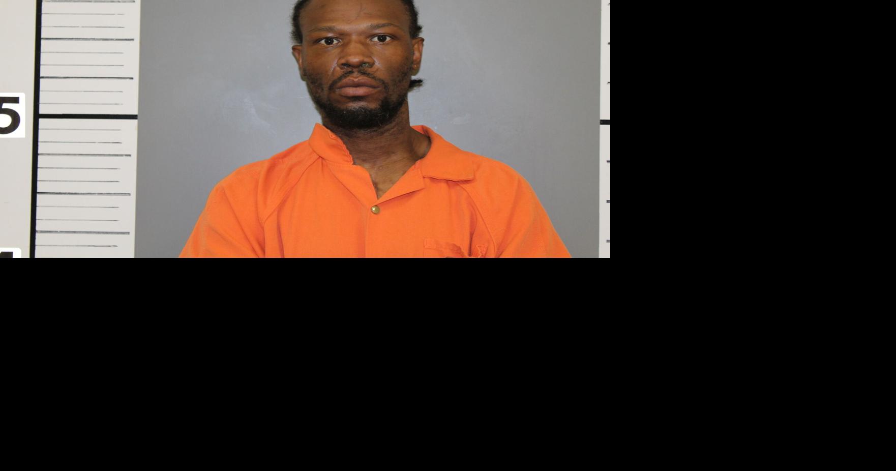 Murder suspect in custody after standoff