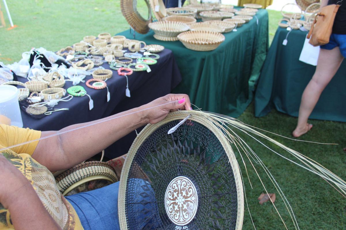 Lynette Youson weaves sweetgrass