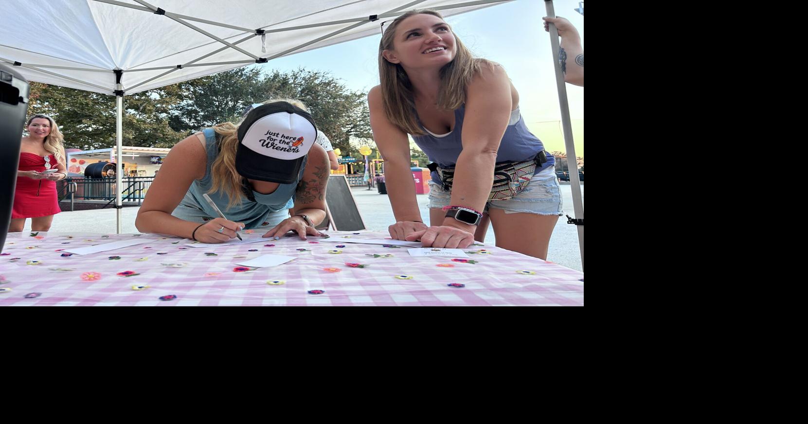 Attendees at Charleston RiverDogs game got free fries. All they had to do was shred their ex.