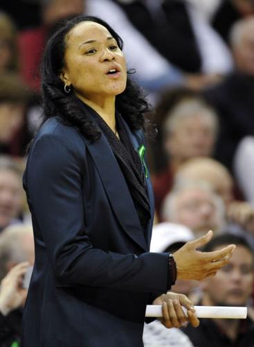 Front Office Sports on X: Dawn Staley is coaching the national title in a  $4,850 Louis Vuitton jacket and matching shoes 👀   / X