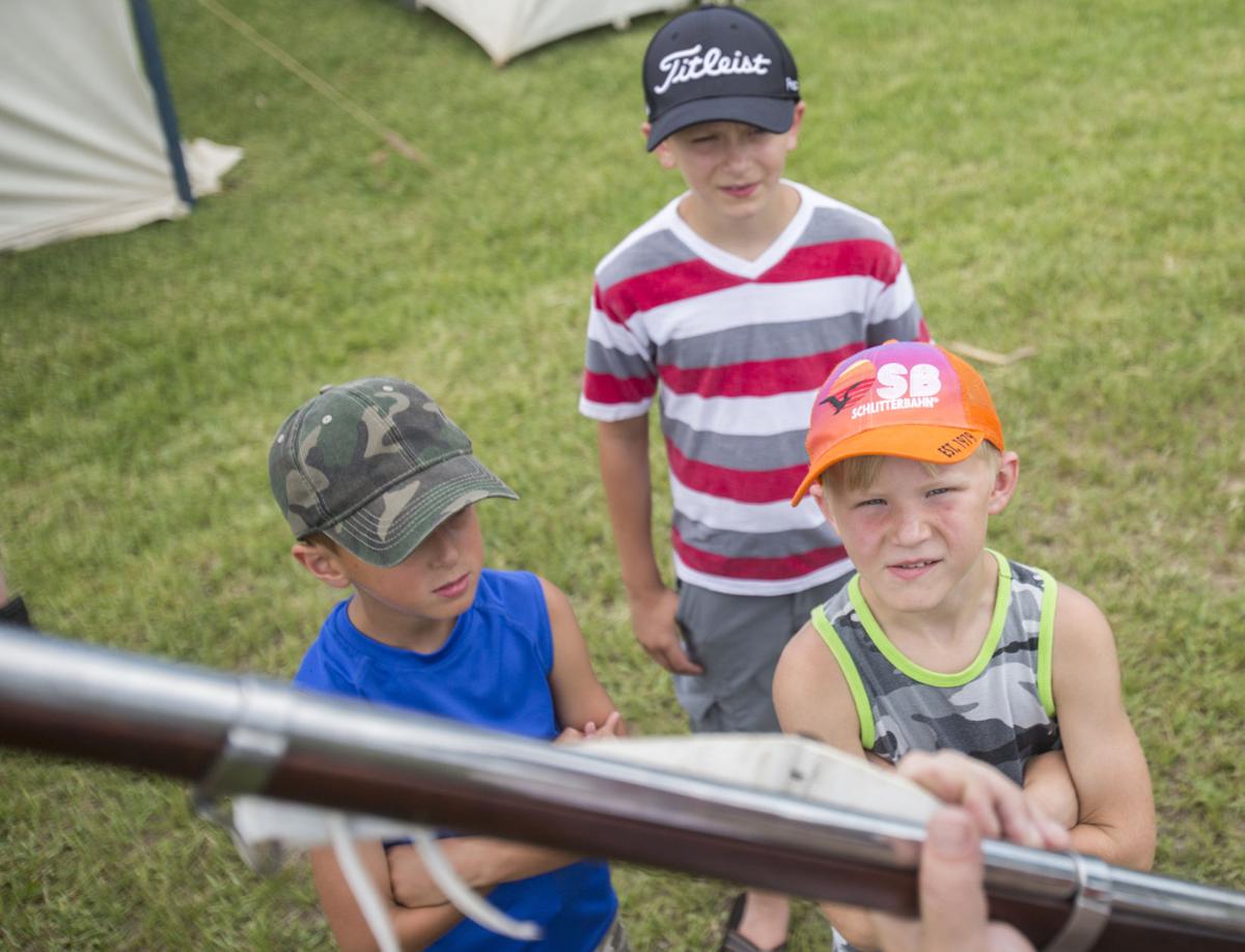kidslookingatgun.JPG