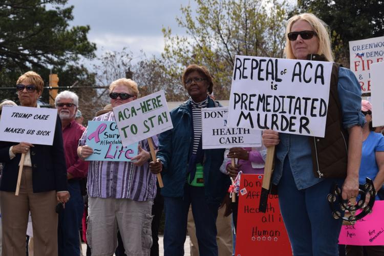 Locals share stories, support at health care rally