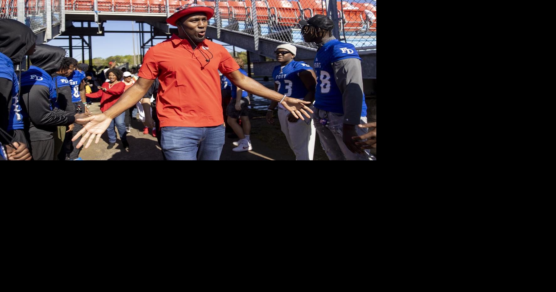 Carlos Dunlap adds Super Bowl ring to his national championship