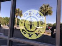 Gold's Gym sign on window at former Southern Season in Mount Pleasant