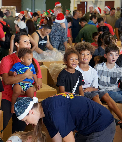 Volunteers Wrap Boxes For Christmas Drop Guam News Postguam Com