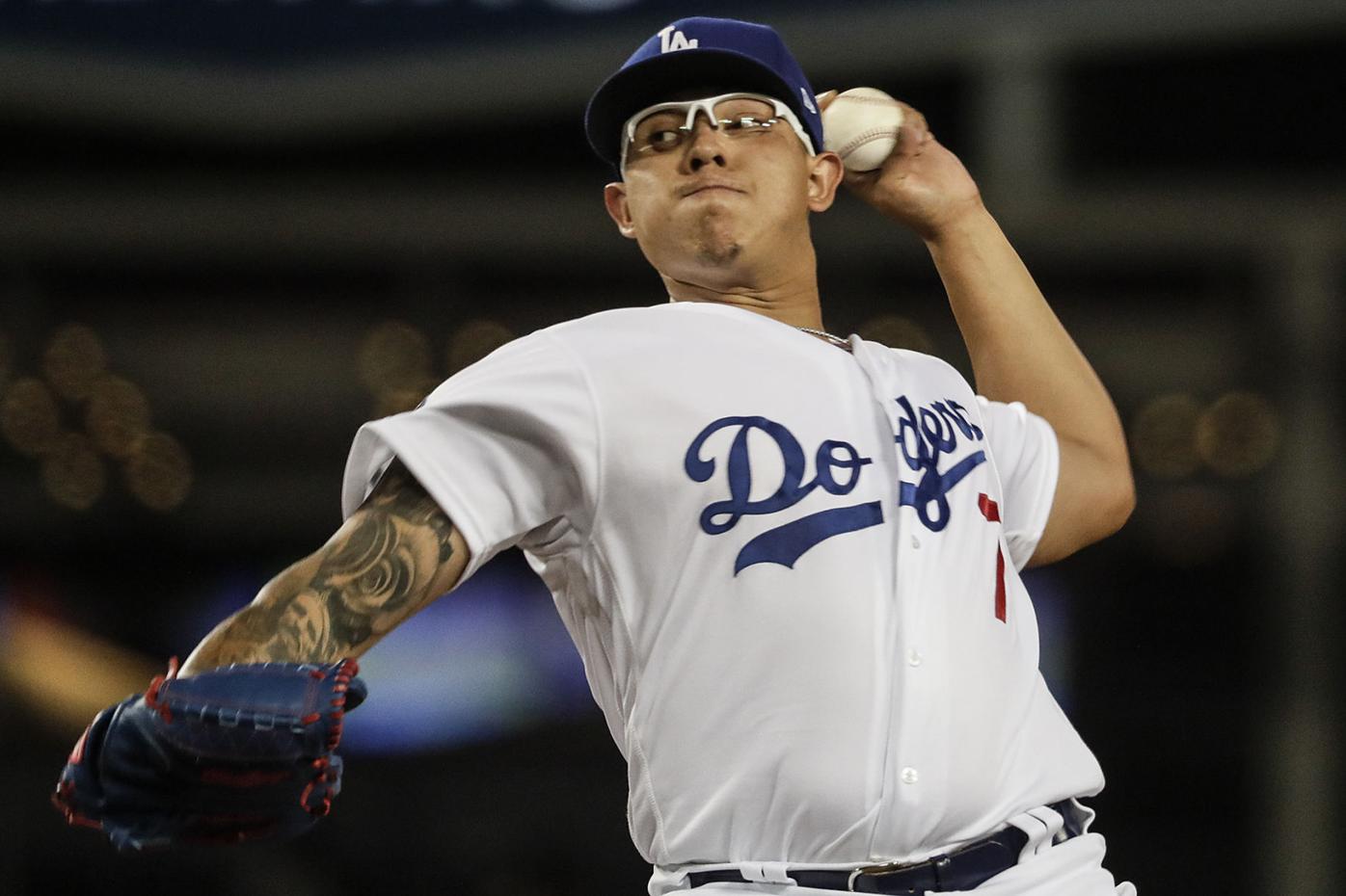 Julio Urias placed on administrative leave while MLB investigates second  domestic violence incident