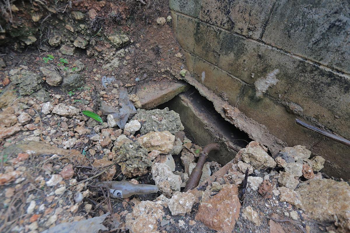 Homeowner fights to keep home from sinking | Guam News ...
