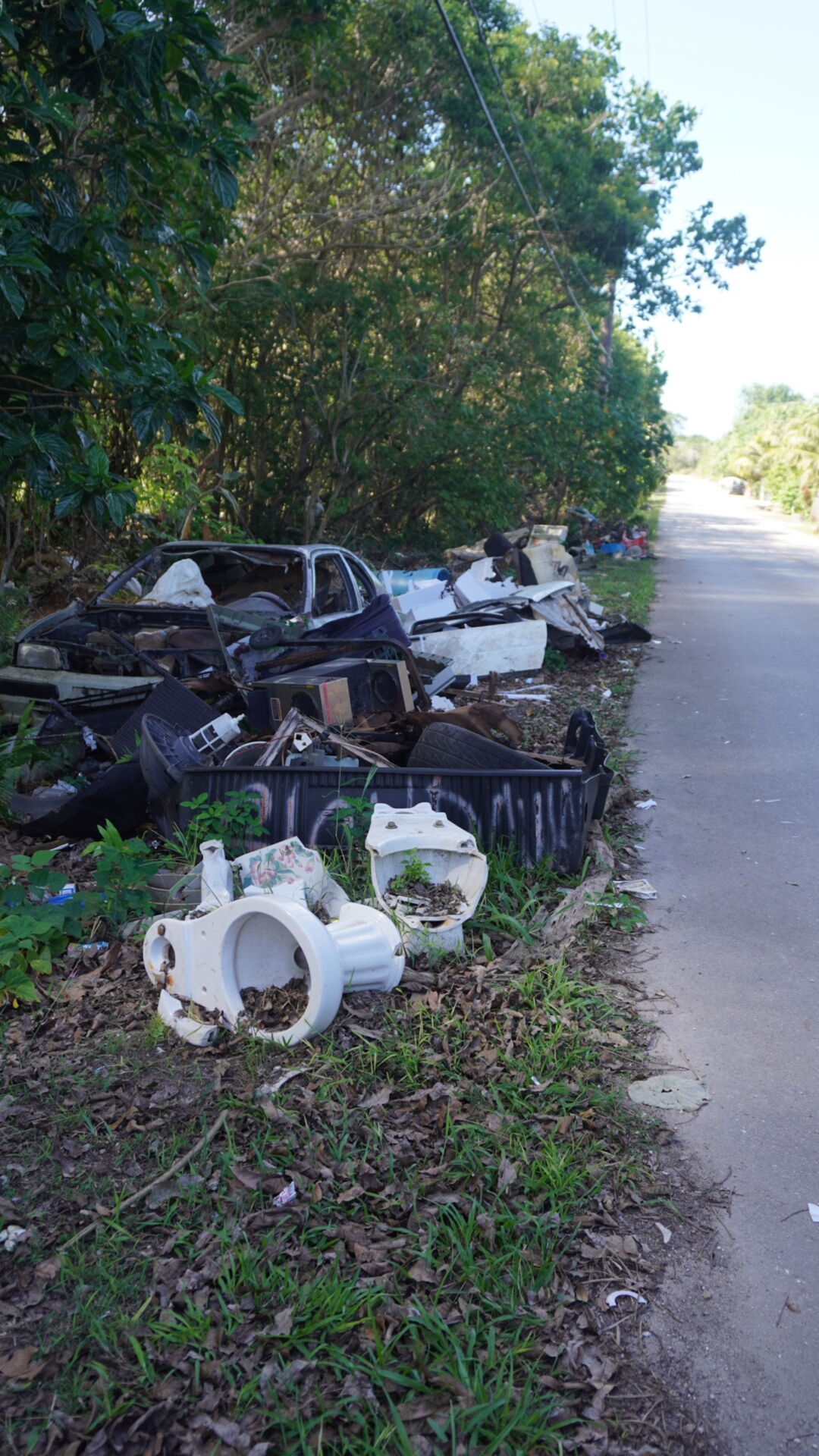 Resident frustrated with illegally dumped trash cars at Zero Down