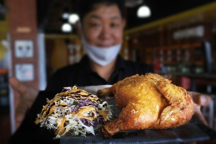 Family restaurant specializes in whole fried chicken in Tumon