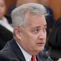 AG opposes governor's $21K fee request